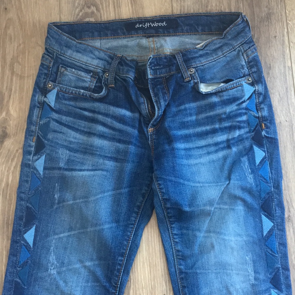 Jeans with tribal side embroidery